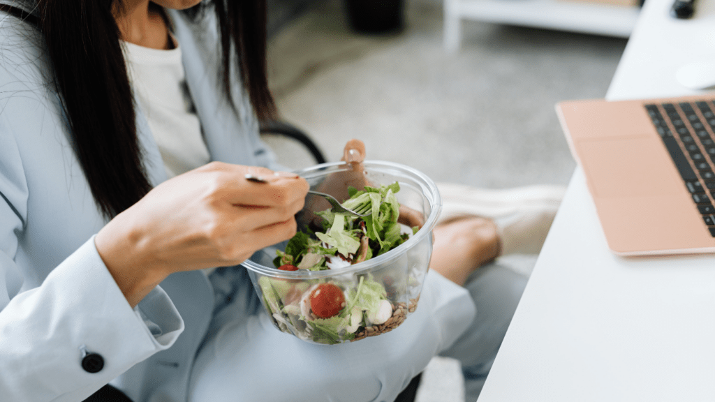 a person eating a salad
