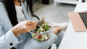 a person eating a salad