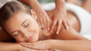 a person getting a back massage at a spa