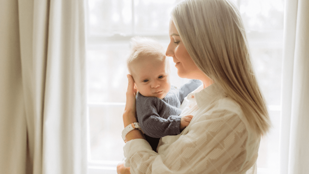 a person holding a baby