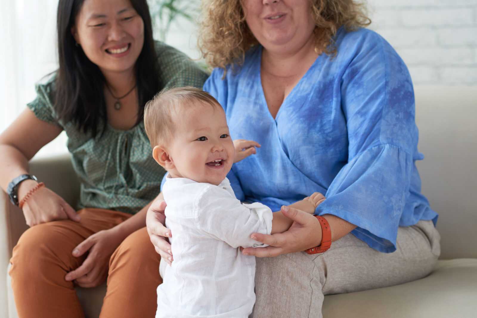 Joyful Boy with Two Mothers