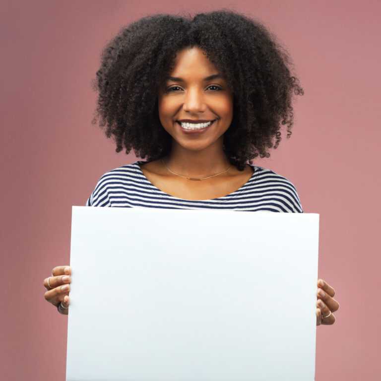 studio-shot-of-an-attractive-young-woman-holding-a-2025-04-06-07-27-34-utc
